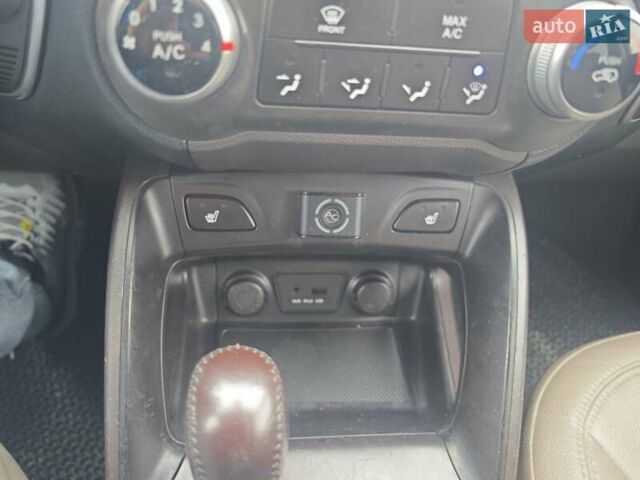 Коричневый Хендай Туксон, объемом двигателя 2.4 л и пробегом 148 тыс. км за 11700 $, фото 34 на Automoto.ua