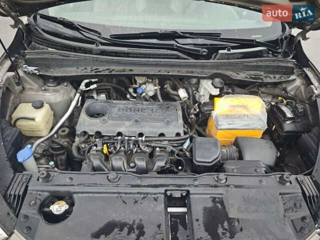 Коричневый Хендай Туксон, объемом двигателя 2.4 л и пробегом 148 тыс. км за 11700 $, фото 32 на Automoto.ua