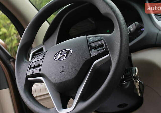 Коричневый Хендай Туксон, объемом двигателя 1.59 л и пробегом 127 тыс. км за 14400 $, фото 6 на Automoto.ua