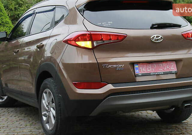 Коричневый Хендай Туксон, объемом двигателя 1.59 л и пробегом 127 тыс. км за 14400 $, фото 20 на Automoto.ua