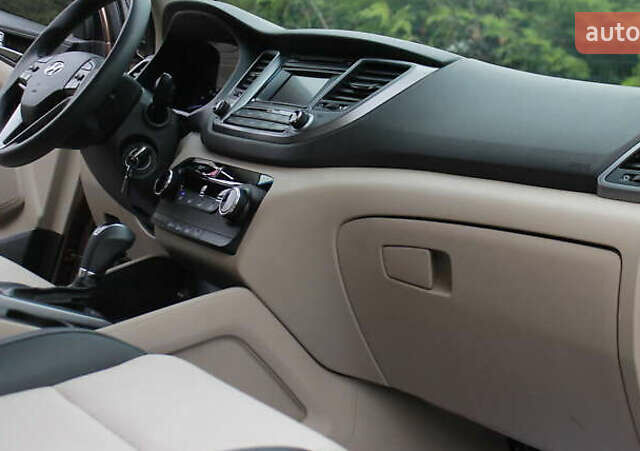 Коричневый Хендай Туксон, объемом двигателя 1.59 л и пробегом 127 тыс. км за 14400 $, фото 9 на Automoto.ua