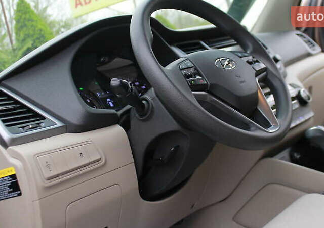 Коричневый Хендай Туксон, объемом двигателя 1.59 л и пробегом 127 тыс. км за 14400 $, фото 4 на Automoto.ua