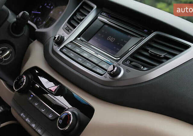 Коричневый Хендай Туксон, объемом двигателя 1.59 л и пробегом 127 тыс. км за 14400 $, фото 11 на Automoto.ua