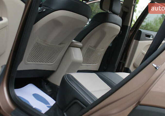 Коричневый Хендай Туксон, объемом двигателя 1.59 л и пробегом 127 тыс. км за 14400 $, фото 18 на Automoto.ua