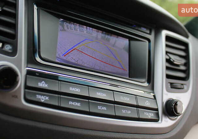 Коричневый Хендай Туксон, объемом двигателя 1.59 л и пробегом 127 тыс. км за 14400 $, фото 10 на Automoto.ua