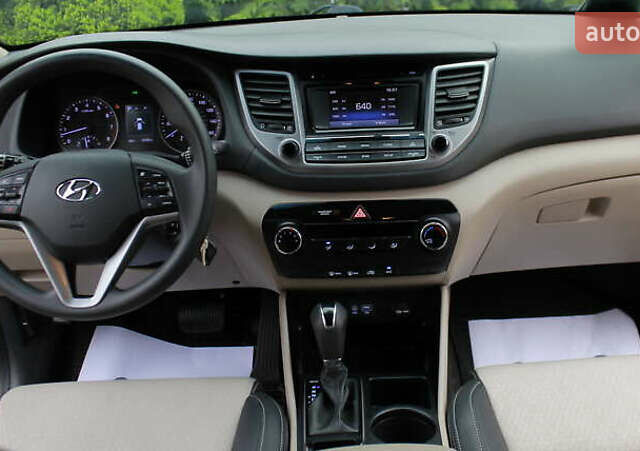 Коричневый Хендай Туксон, объемом двигателя 1.59 л и пробегом 127 тыс. км за 14400 $, фото 7 на Automoto.ua