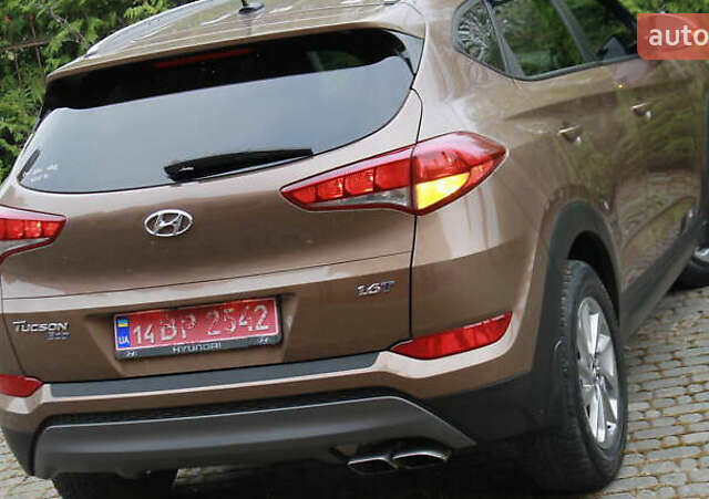 Коричневый Хендай Туксон, объемом двигателя 1.59 л и пробегом 127 тыс. км за 14400 $, фото 22 на Automoto.ua