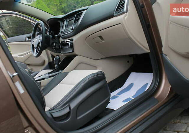 Коричневый Хендай Туксон, объемом двигателя 1.59 л и пробегом 127 тыс. км за 14400 $, фото 15 на Automoto.ua