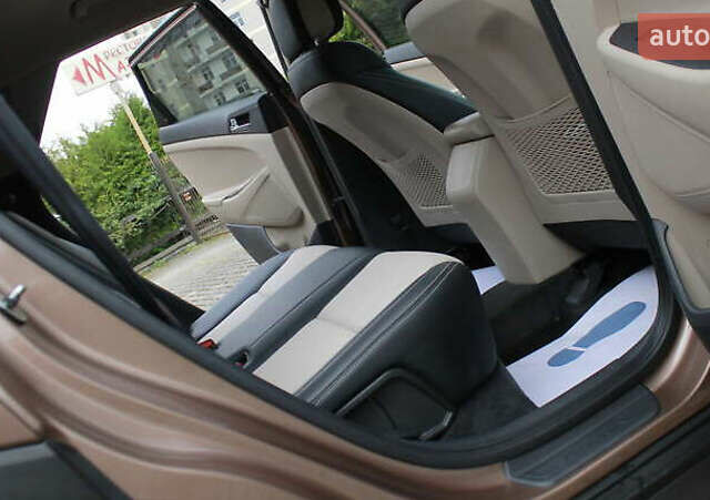 Коричневый Хендай Туксон, объемом двигателя 1.59 л и пробегом 127 тыс. км за 14400 $, фото 16 на Automoto.ua