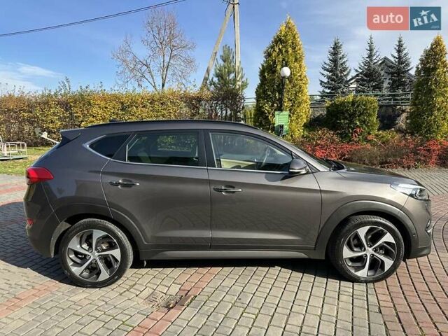 Коричневый Хендай Туксон, объемом двигателя 2 л и пробегом 100 тыс. км за 23500 $, фото 8 на Automoto.ua