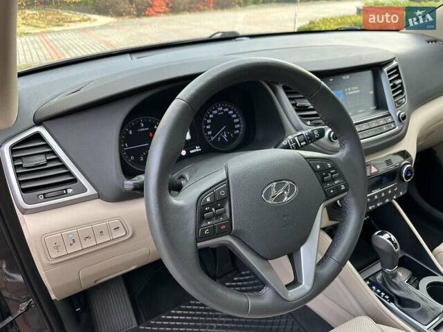 Коричневый Хендай Туксон, объемом двигателя 2 л и пробегом 100 тыс. км за 23500 $, фото 27 на Automoto.ua