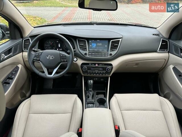 Коричневый Хендай Туксон, объемом двигателя 2 л и пробегом 100 тыс. км за 23500 $, фото 30 на Automoto.ua