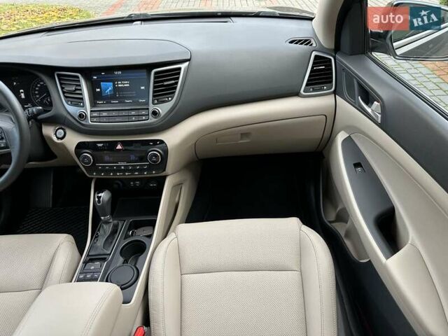 Коричневый Хендай Туксон, объемом двигателя 2 л и пробегом 100 тыс. км за 23500 $, фото 29 на Automoto.ua