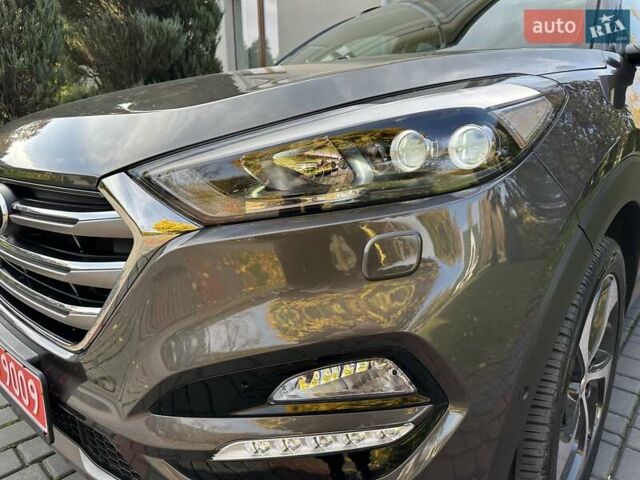 Коричневый Хендай Туксон, объемом двигателя 2 л и пробегом 100 тыс. км за 23500 $, фото 90 на Automoto.ua
