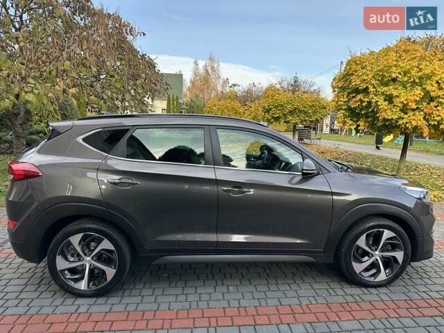 Коричневый Хендай Туксон, объемом двигателя 2 л и пробегом 100 тыс. км за 23500 $, фото 20 на Automoto.ua