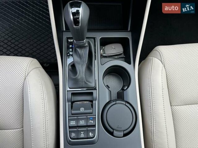 Коричневый Хендай Туксон, объемом двигателя 2 л и пробегом 100 тыс. км за 23500 $, фото 35 на Automoto.ua