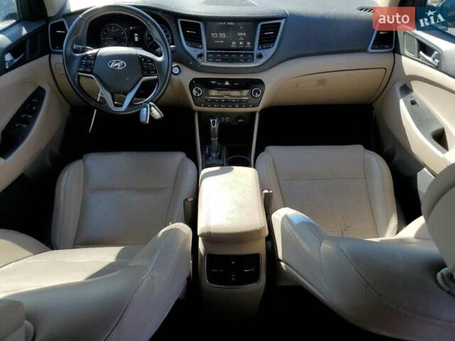 Коричневый Хендай Туксон, объемом двигателя 1.6 л и пробегом 96 тыс. км за 2500 $, фото 7 на Automoto.ua