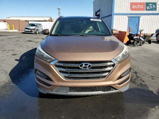 Коричневый Хендай Туксон, объемом двигателя 1.6 л и пробегом 96 тыс. км за 2500 $, фото 4 на Automoto.ua