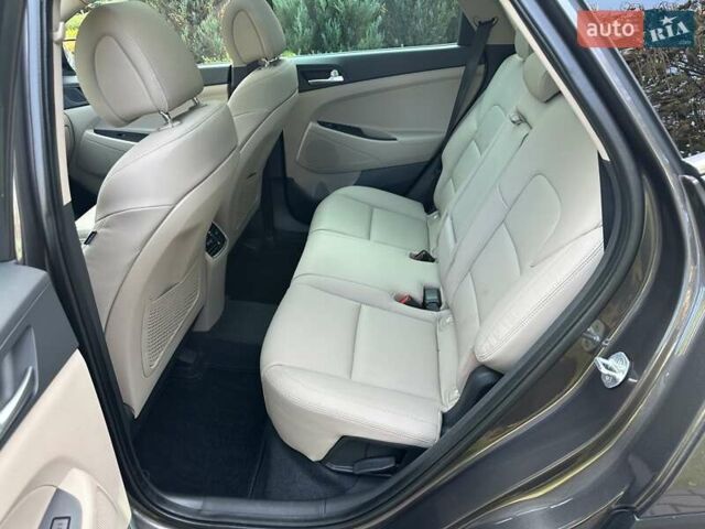 Коричневый Хендай Туксон, объемом двигателя 2 л и пробегом 100 тыс. км за 23500 $, фото 51 на Automoto.ua