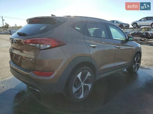 Коричневый Хендай Туксон, объемом двигателя 1.6 л и пробегом 96 тыс. км за 2500 $, фото 2 на Automoto.ua