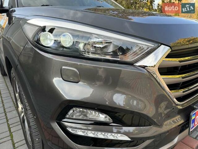 Коричневый Хендай Туксон, объемом двигателя 2 л и пробегом 100 тыс. км за 23500 $, фото 92 на Automoto.ua
