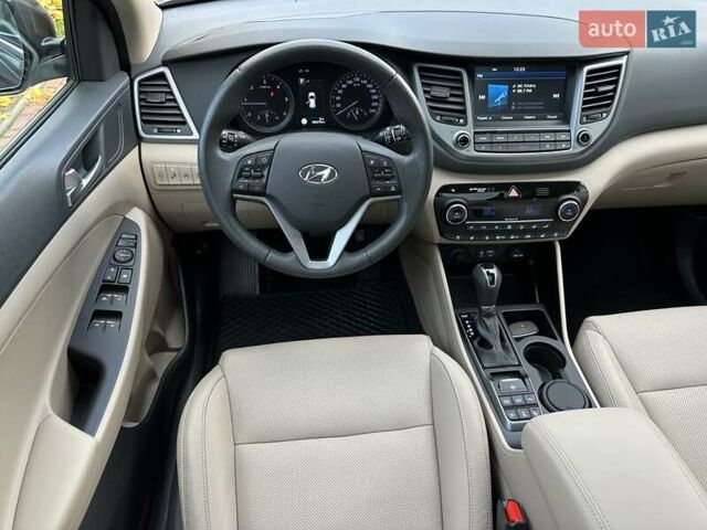 Коричневый Хендай Туксон, объемом двигателя 2 л и пробегом 100 тыс. км за 23500 $, фото 28 на Automoto.ua