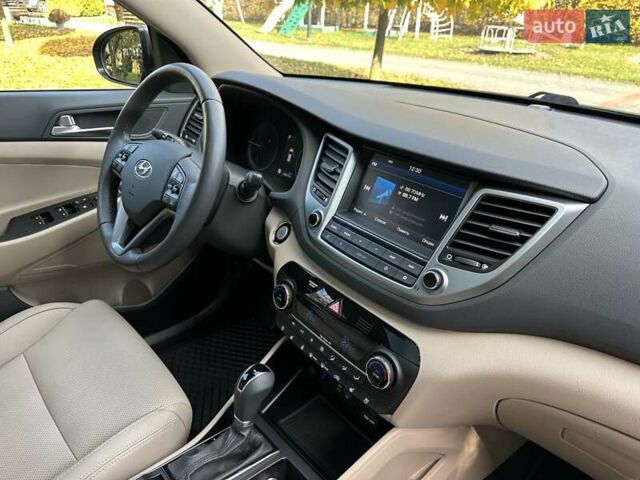 Коричневый Хендай Туксон, объемом двигателя 2 л и пробегом 100 тыс. км за 23500 $, фото 59 на Automoto.ua