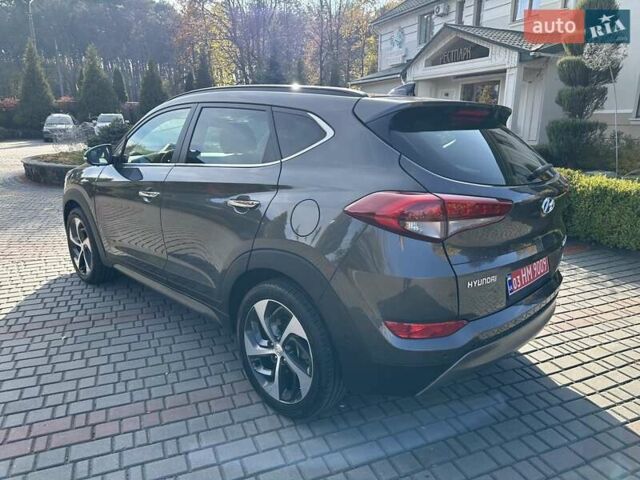 Коричневый Хендай Туксон, объемом двигателя 2 л и пробегом 100 тыс. км за 23500 $, фото 5 на Automoto.ua