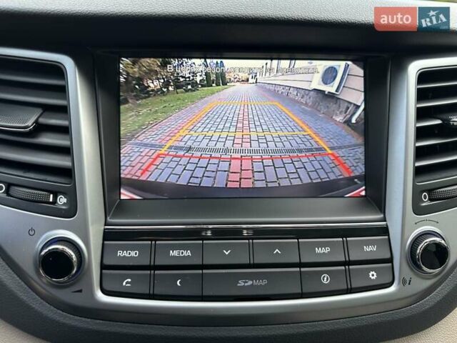 Коричневый Хендай Туксон, объемом двигателя 2 л и пробегом 100 тыс. км за 23500 $, фото 33 на Automoto.ua