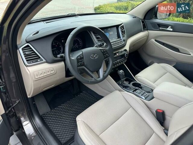 Коричневый Хендай Туксон, объемом двигателя 2 л и пробегом 100 тыс. км за 23500 $, фото 25 на Automoto.ua