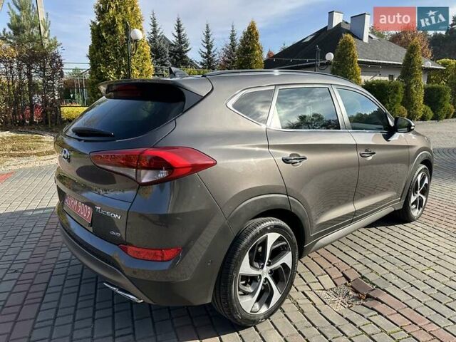 Коричневый Хендай Туксон, объемом двигателя 2 л и пробегом 100 тыс. км за 23500 $, фото 9 на Automoto.ua