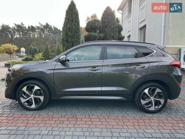 Коричневый Хендай Туксон, объемом двигателя 2 л и пробегом 100 тыс. км за 23500 $, фото 16 на Automoto.ua