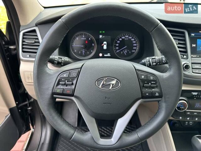 Коричневый Хендай Туксон, объемом двигателя 2 л и пробегом 100 тыс. км за 23500 $, фото 38 на Automoto.ua