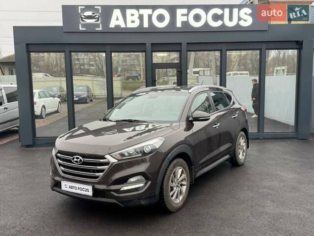 Коричневый Хендай Туксон, объемом двигателя 2 л и пробегом 115 тыс. км за 20990 $, фото 3 на Automoto.ua