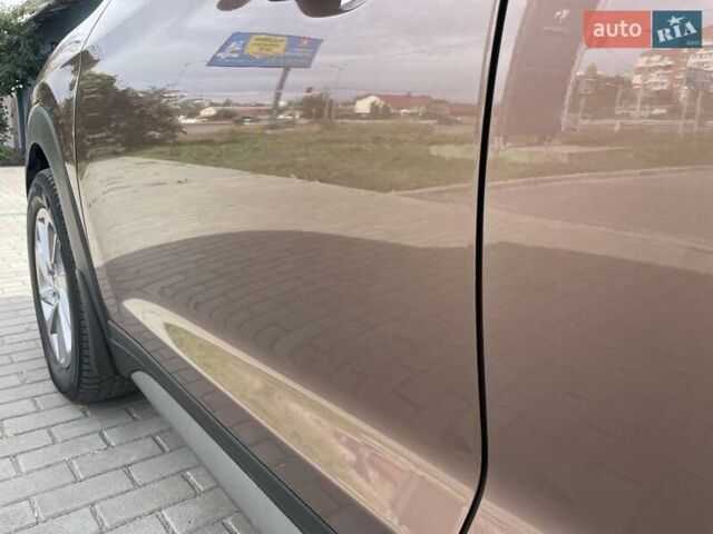 Коричневый Хендай Туксон, объемом двигателя 2 л и пробегом 115 тыс. км за 14200 $, фото 13 на Automoto.ua