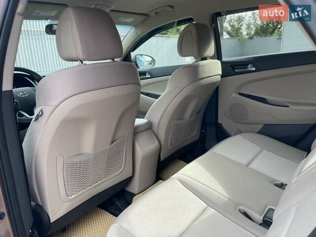 Коричневый Хендай Туксон, объемом двигателя 2 л и пробегом 115 тыс. км за 14200 $, фото 36 на Automoto.ua