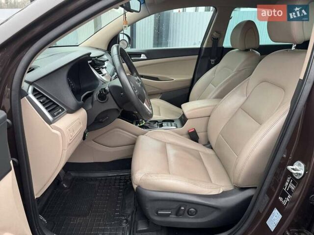 Коричневый Хендай Туксон, объемом двигателя 2 л и пробегом 115 тыс. км за 20990 $, фото 8 на Automoto.ua