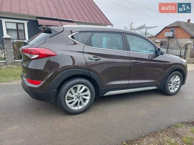 Коричневий Хендай Туксон, об'ємом двигуна 2 л та пробігом 87 тис. км за 19300 $, фото 10 на Automoto.ua