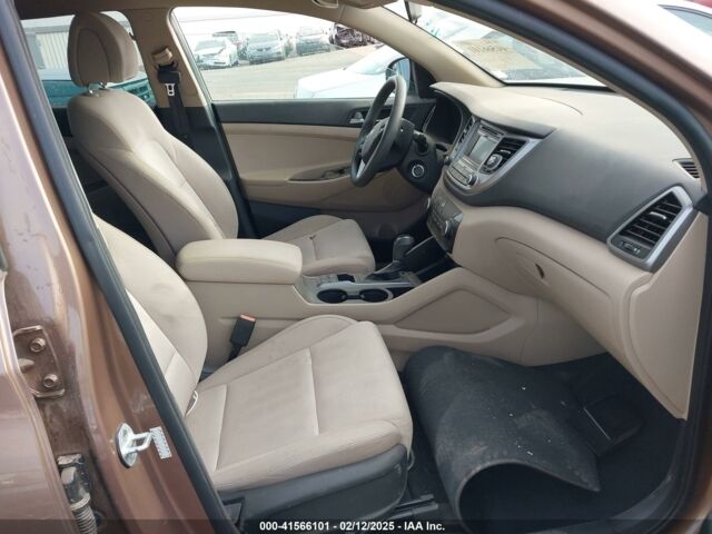 Коричневый Хендай Туксон, объемом двигателя 2 л и пробегом 143 тыс. км за 11550 $, фото 8 на Automoto.ua