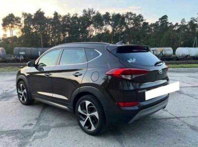 Коричневый Хендай Туксон, объемом двигателя 2 л и пробегом 140 тыс. км за 12100 $, фото 5 на Automoto.ua