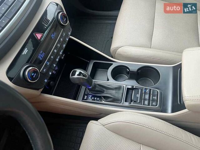 Коричневий Хендай Туксон, об'ємом двигуна 2 л та пробігом 108 тис. км за 18700 $, фото 34 на Automoto.ua