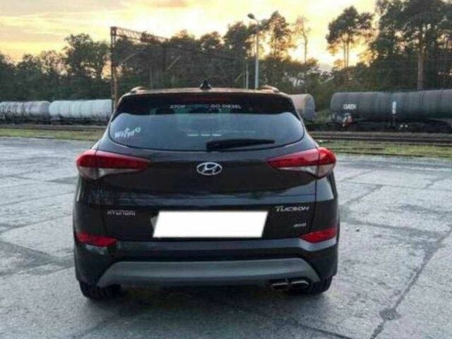 Коричневый Хендай Туксон, объемом двигателя 2 л и пробегом 140 тыс. км за 12100 $, фото 2 на Automoto.ua