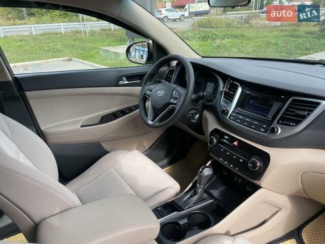 Коричневый Хендай Туксон, объемом двигателя 2 л и пробегом 115 тыс. км за 14200 $, фото 24 на Automoto.ua