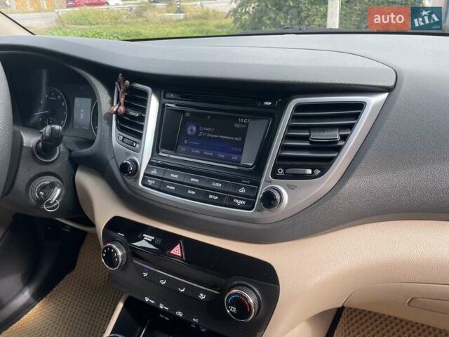 Коричневый Хендай Туксон, объемом двигателя 2 л и пробегом 115 тыс. км за 14200 $, фото 25 на Automoto.ua