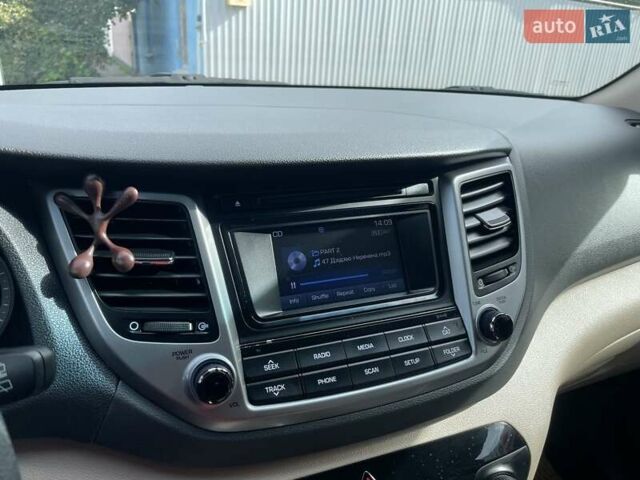 Коричневый Хендай Туксон, объемом двигателя 2 л и пробегом 115 тыс. км за 14200 $, фото 26 на Automoto.ua