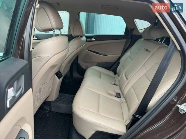 Коричневый Хендай Туксон, объемом двигателя 2 л и пробегом 115 тыс. км за 20990 $, фото 9 на Automoto.ua