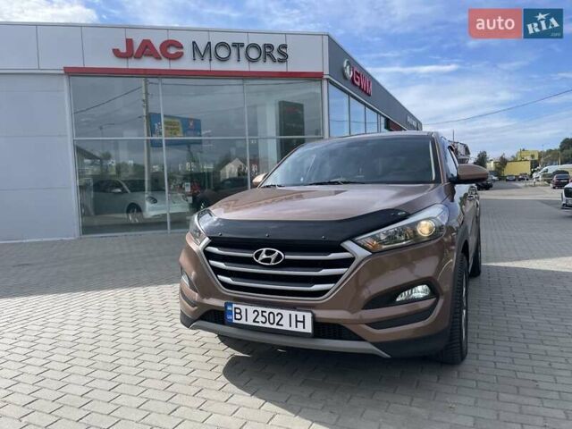 Коричневый Хендай Туксон, объемом двигателя 2 л и пробегом 115 тыс. км за 14200 $, фото 11 на Automoto.ua