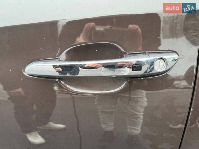 Коричневый Хендай Туксон, объемом двигателя 2 л и пробегом 115 тыс. км за 20990 $, фото 28 на Automoto.ua