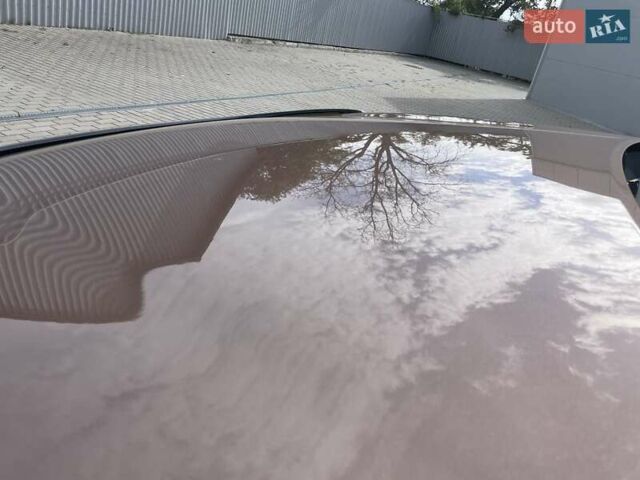 Коричневый Хендай Туксон, объемом двигателя 2 л и пробегом 115 тыс. км за 14200 $, фото 12 на Automoto.ua