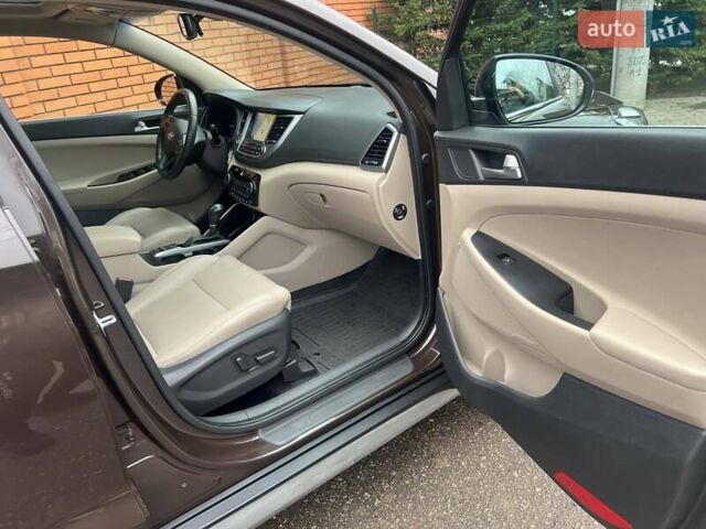 Коричневий Хендай Туксон, об'ємом двигуна 2 л та пробігом 108 тис. км за 18700 $, фото 42 на Automoto.ua